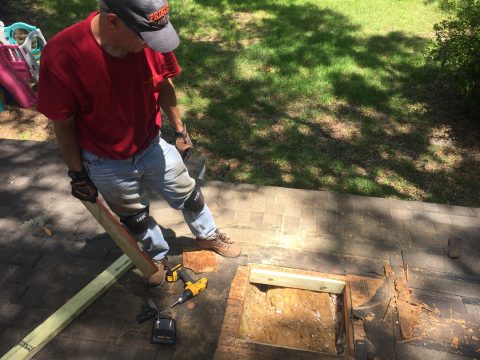 Repairing hole in a roof